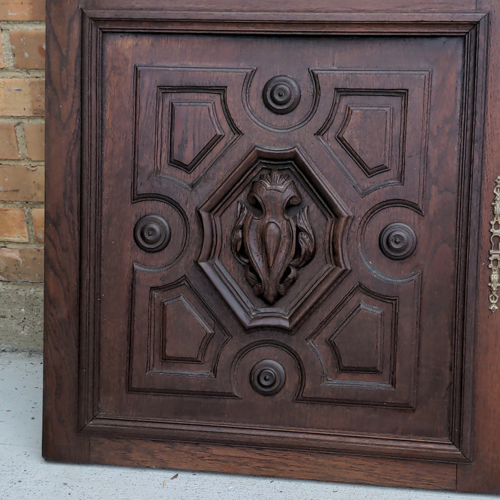 PAIR OF SQUARE HENRI II CARVED OAK CABINET DOORS