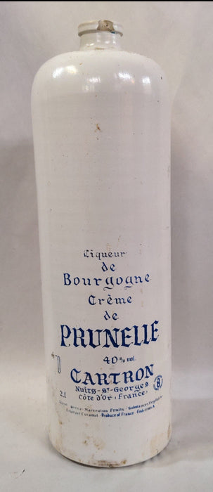 TALL POTTERY LIQUOR BOTTLE AS FOUND