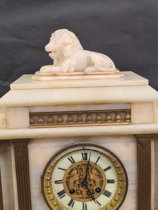 WHITE MARBLE MANTLE CLOCK WITH ORMOLU AND LION