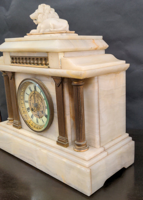 WHITE MARBLE MANTLE CLOCK WITH ORMOLU AND LION