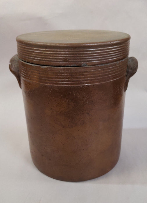 Small brown crock with lid