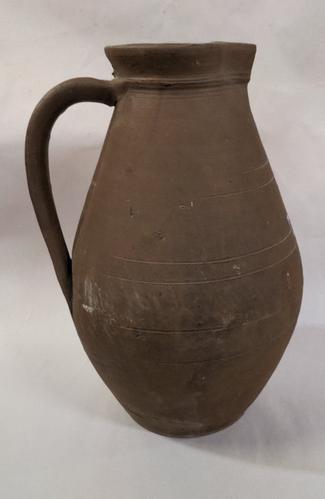 TALL POTTERY PITCHER