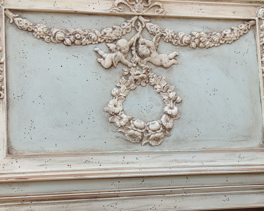 TRUMEAU MIRROR WITH PLASTER PUTTI FREIZE - NOT OLD