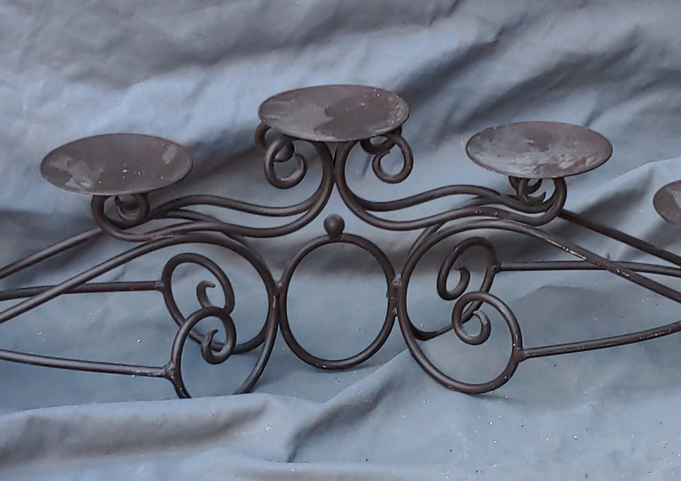 SEVEN LIGHT BENT IRON ARCHED CANDLE STAND