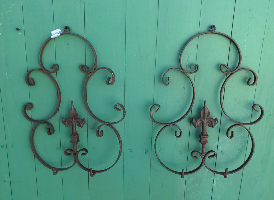 PAIR OF IRON FLEUR-DE-LIS WALL HANGERS