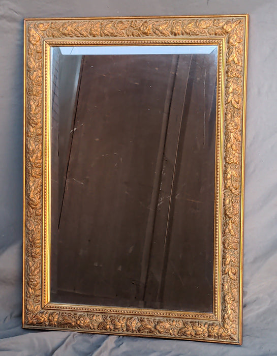 SMALL BEVELED GLASS MIRROR IN GOLD LEAF FRAME