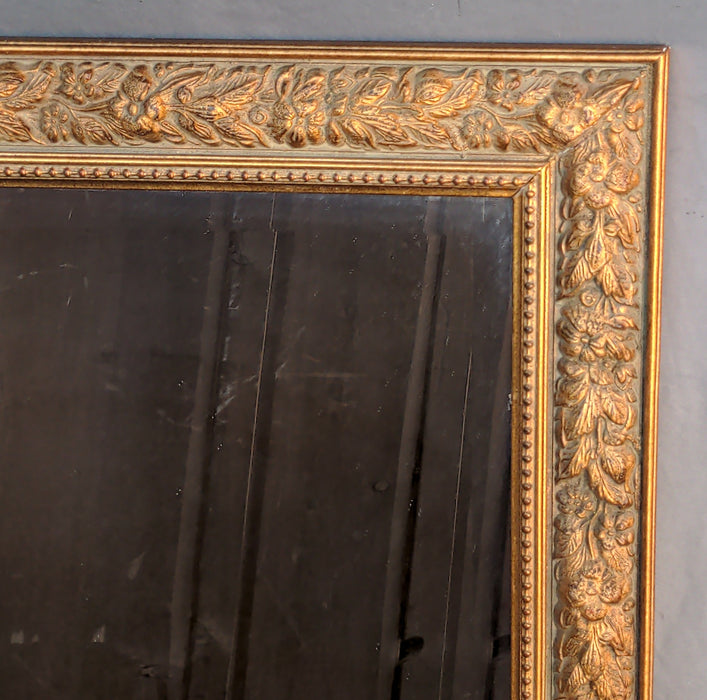 SMALL BEVELED GLASS MIRROR IN GOLD LEAF FRAME