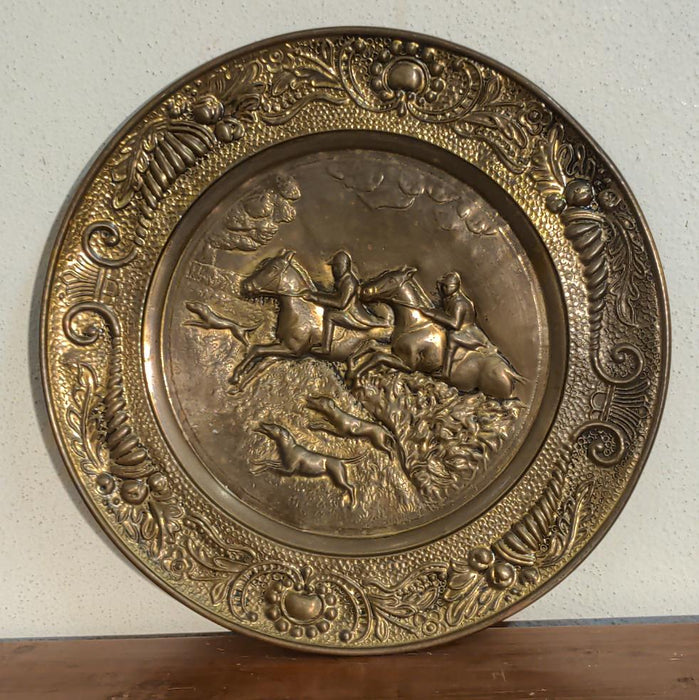 BRASS CHARGER WITH EMBOSSED HORSE RIDERS