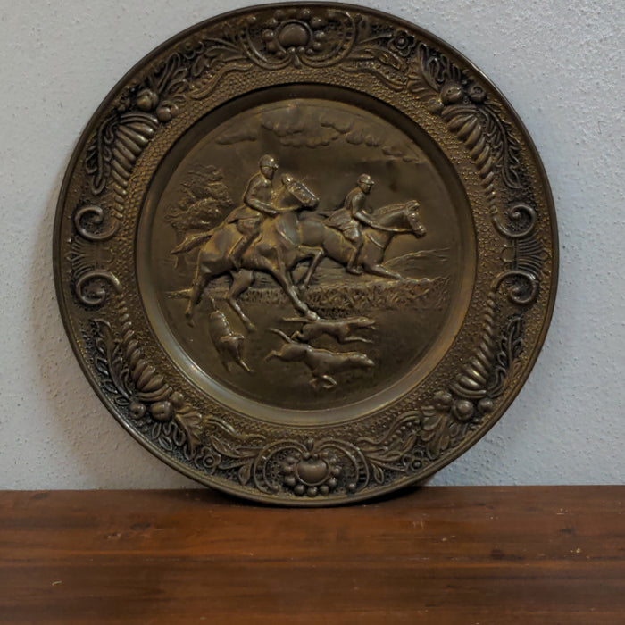 BRASS CHARGER WITH EMBOSSED HORSE RIDERS