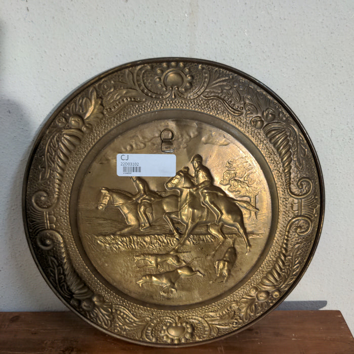 BRASS CHARGER WITH EMBOSSED HORSE RIDERS