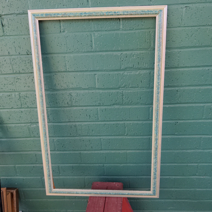 MOTTLED GREEN FRAME WITH SILVER TRIM