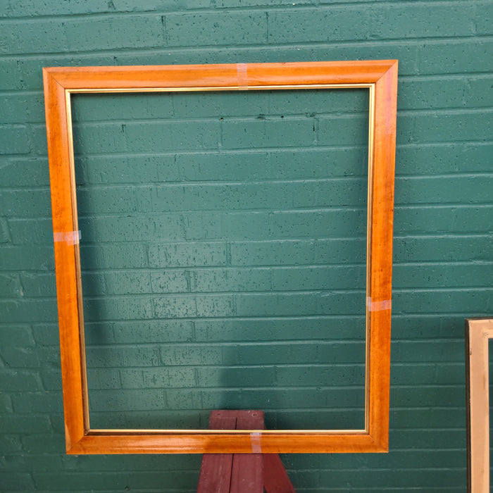 SMALL BURL WOOD FRAME IS FOUND