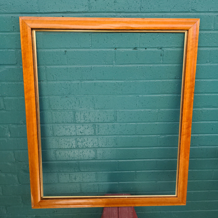 SMALL BURL WOOD FRAME IS FOUND