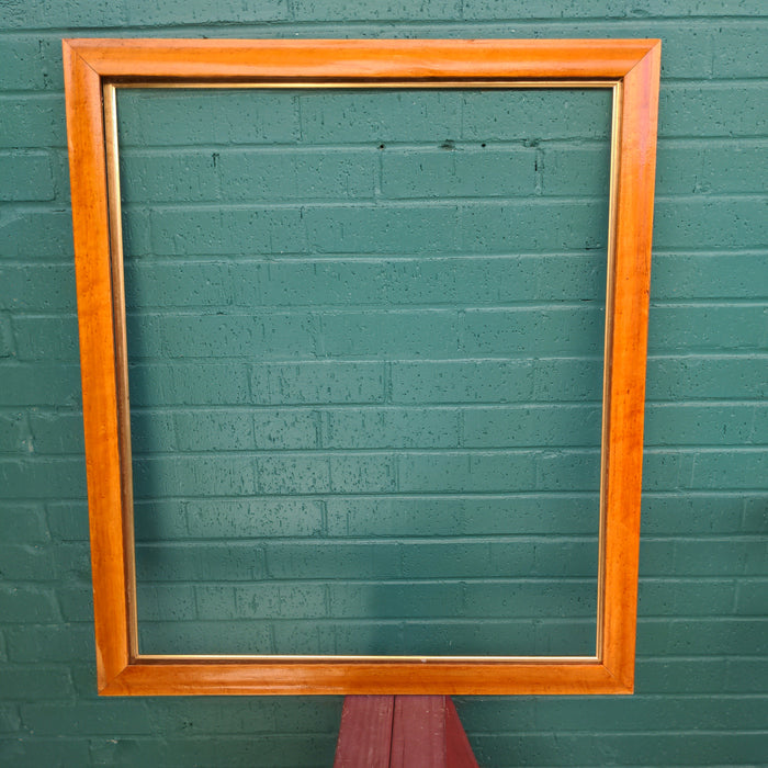 SMALL BURL WOOD FRAME IS FOUND