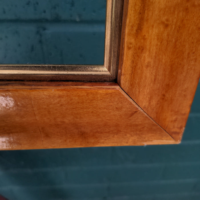 SMALL BURL WOOD FRAME IS FOUND
