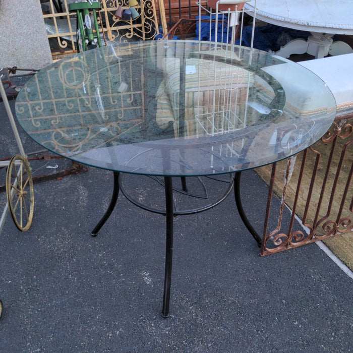 OUTSIDE GLASS-TOP TABLE WITH BLACK METAL BASE