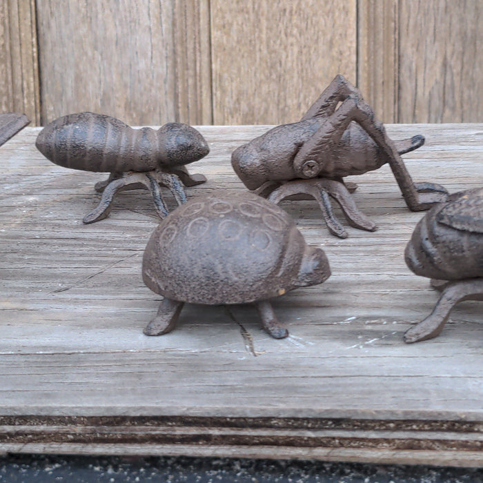 SET OF SIX IRON BUGS