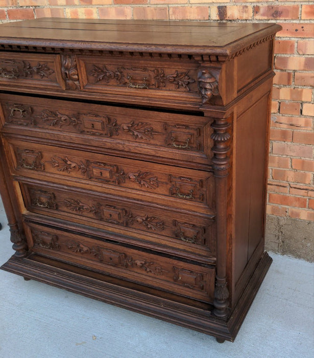 SIX DRAWER FRENCH OAK CHEST WITH HEADS