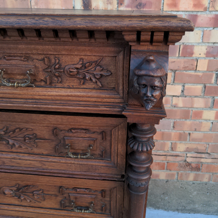 SIX DRAWER FRENCH OAK CHEST WITH HEADS