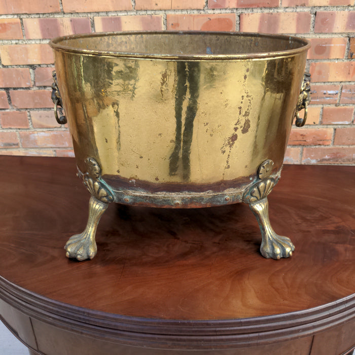 BRASS LIONS HEAD PLANTER WITH PAW FEET