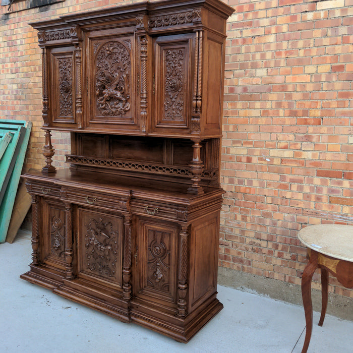 CARVED HENRI II WALNUT BUFFET WITH CHIMERA AND SERPENT