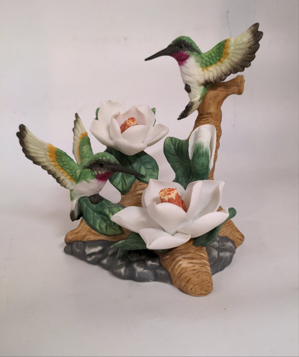 BISQUE HUMMINGBIRDS STATUE