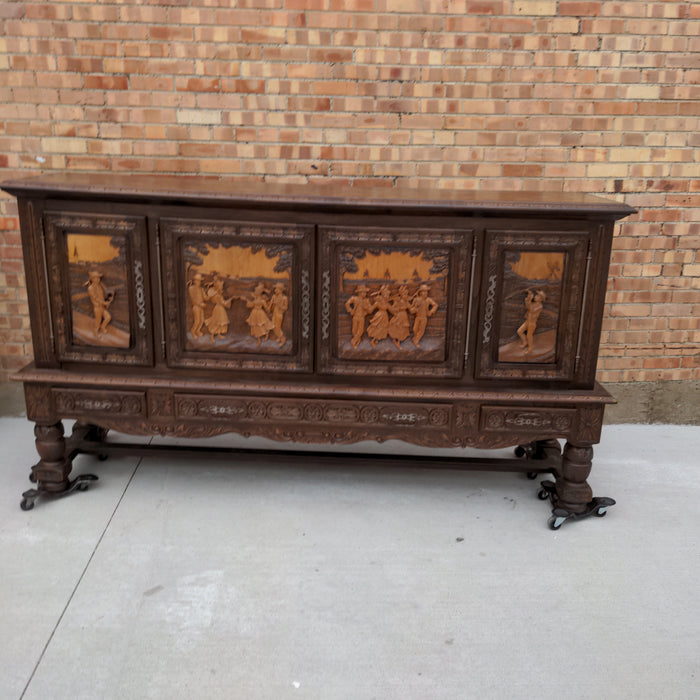 FRENCH BRETON FIGURAL CARVED OAK SIDEBOARD WITH PARQUETRY TOP