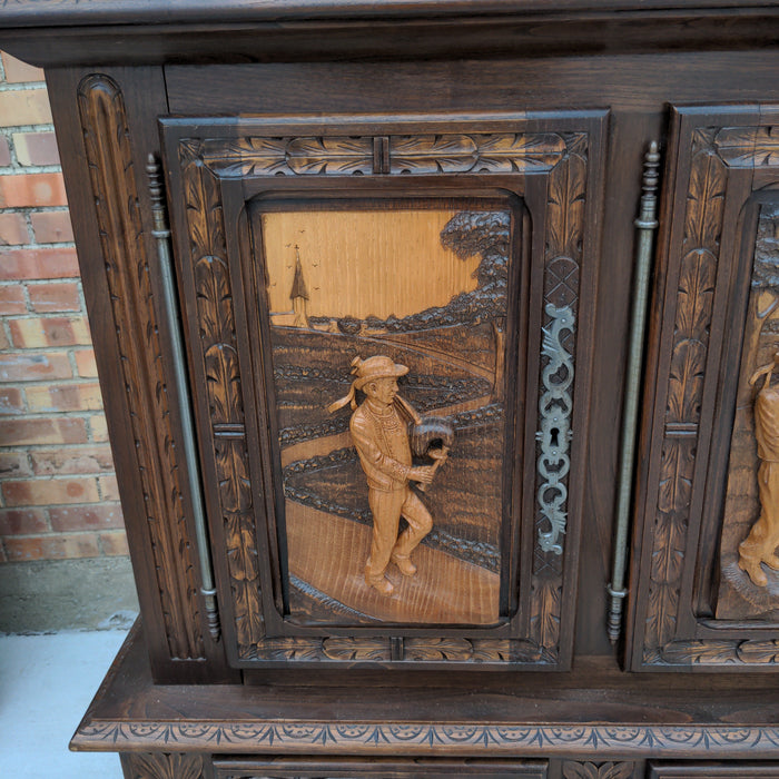 FRENCH BRETON FIGURAL CARVED OAK SIDEBOARD WITH PARQUETRY TOP