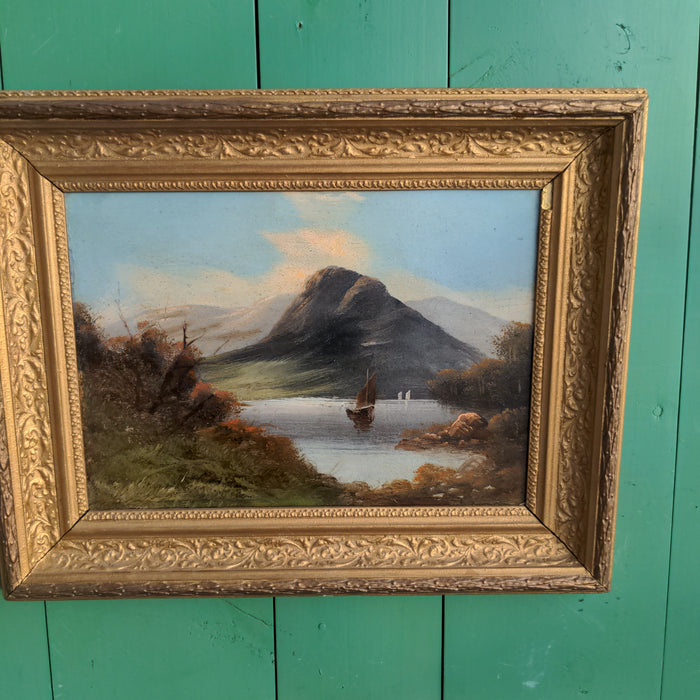 OIL PAINTING ON BOARD OF A BOAT IN LAKE BY A MOUNTAIN