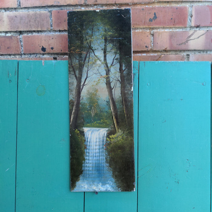 VERTICAL OIL PAINTING OF A WATERFALL ON BOARD