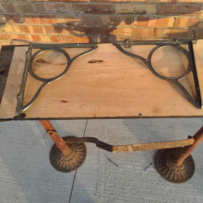 PAIR OF ORNAMENTAL IRON SHELF BRACKETS