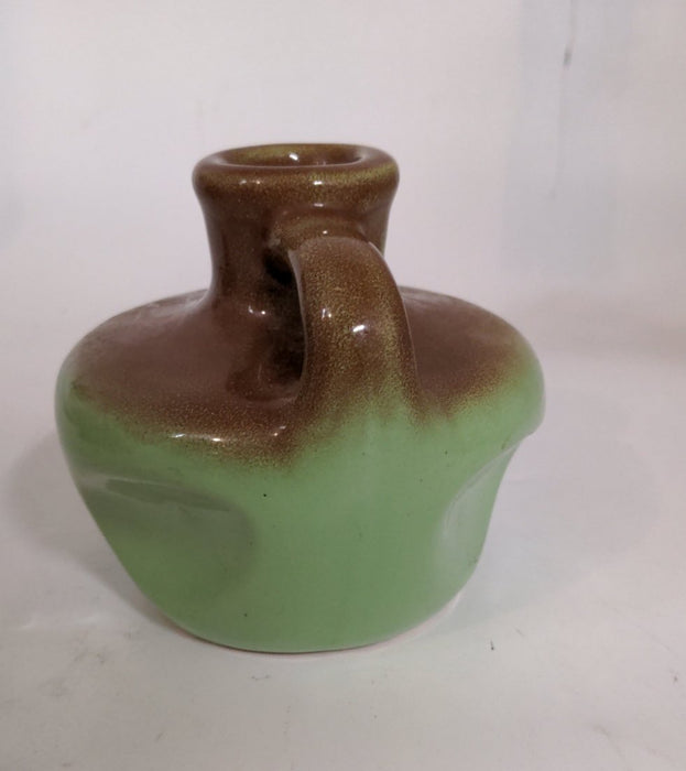 GREEN AND BROWN POTTERY JUG MK CANDLES SYRACUSE NEW YORK