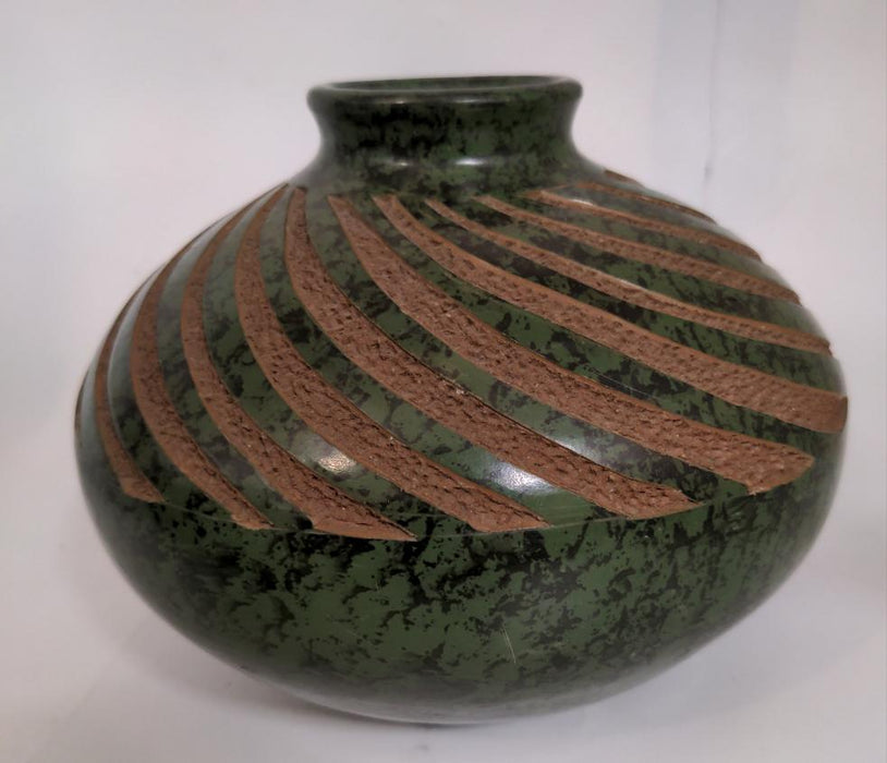 GREEN GLAZED POTTERY VASE WITH TERRACOTTA SWIRLS