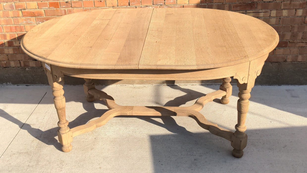 RAW OAK OVAL PEGGED  TABLE AND TWO POP UP LEAVES THAT ARE HIDDEN INSIDE!