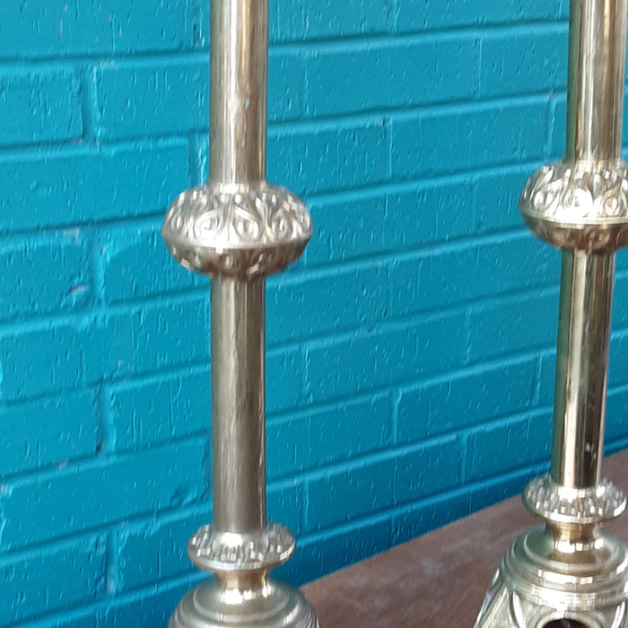 PAIR OF BRASS PRICKETTS (CANDLE STANDS) AS FOUND