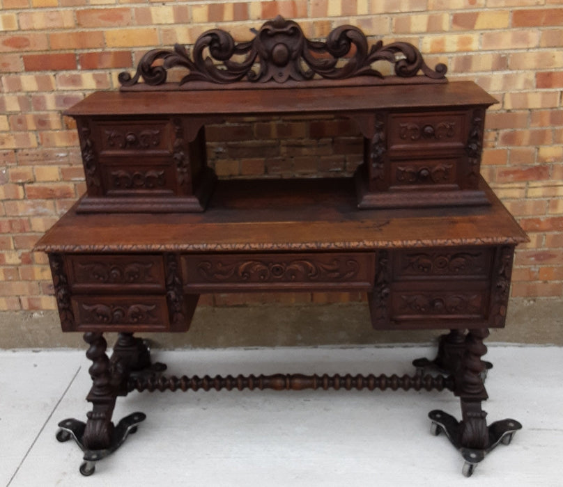 NICELY CARVED BARLEY TWIST DESK WITH TOP DRAWERS