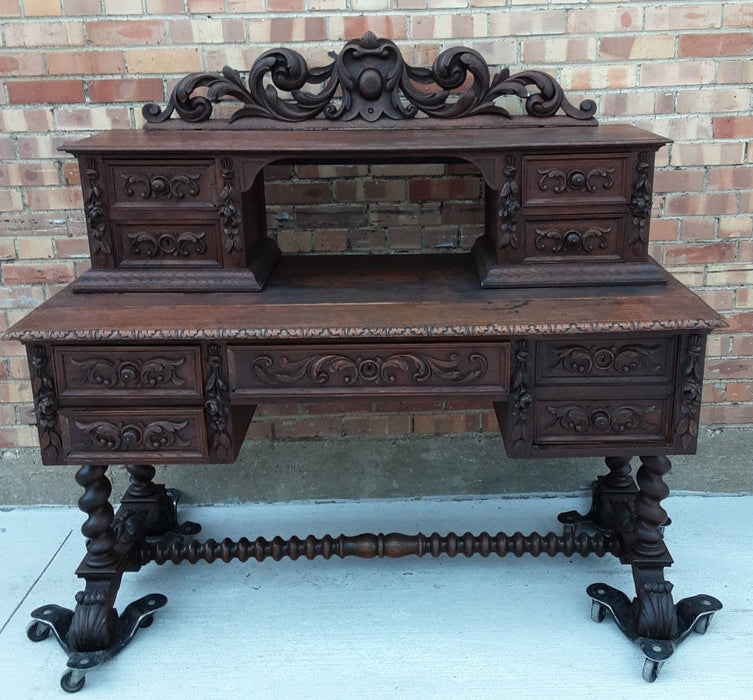 NICELY CARVED BARLEY TWIST DESK WITH TOP DRAWERS