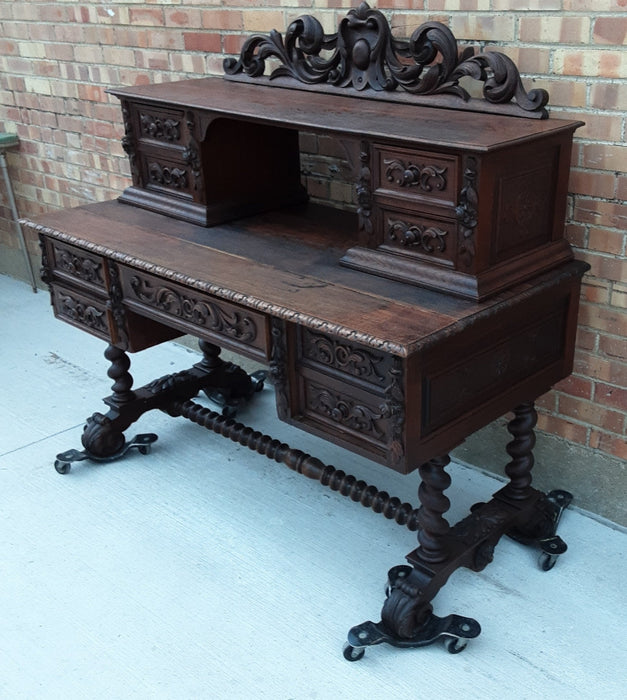 NICELY CARVED BARLEY TWIST DESK WITH TOP DRAWERS