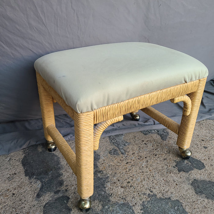 UPHOLSTERED WICKER STOOL ON CASTERS