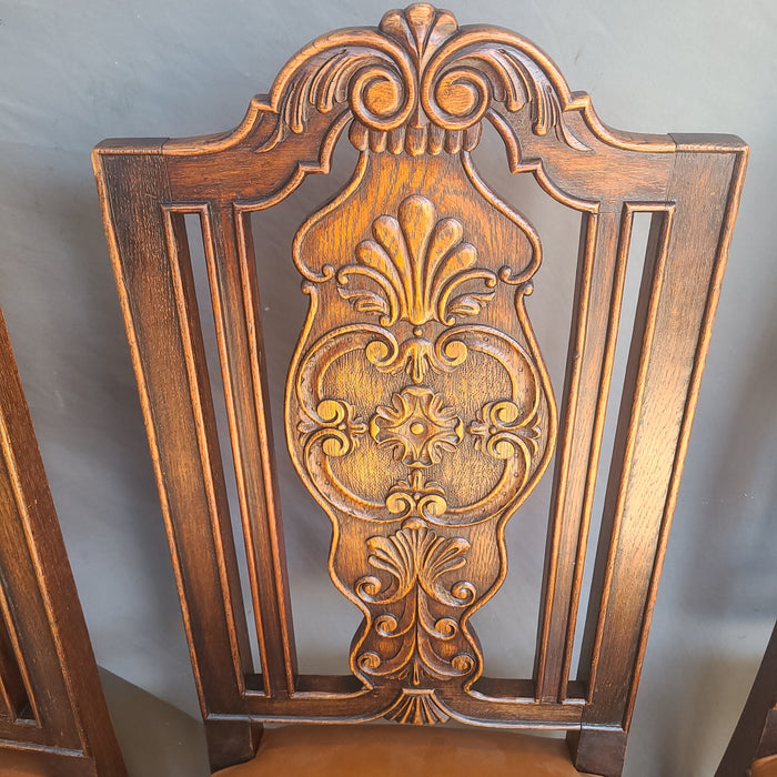 SET OF 8 CARVED TUDOR OAK DINING CHAIRS