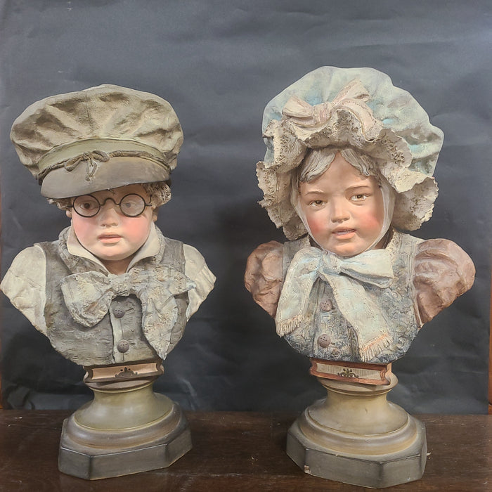 PAIR OF BUSTS OF CHILDREN OF THE 19TH CENTURY