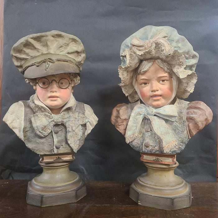PAIR OF BUSTS OF CHILDREN OF THE 19TH CENTURY