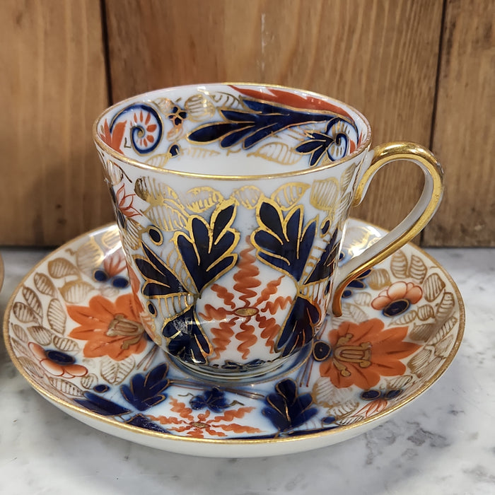 PAIR OF GAUDY WELCH ENGLISH CUPS AND SAUCERS