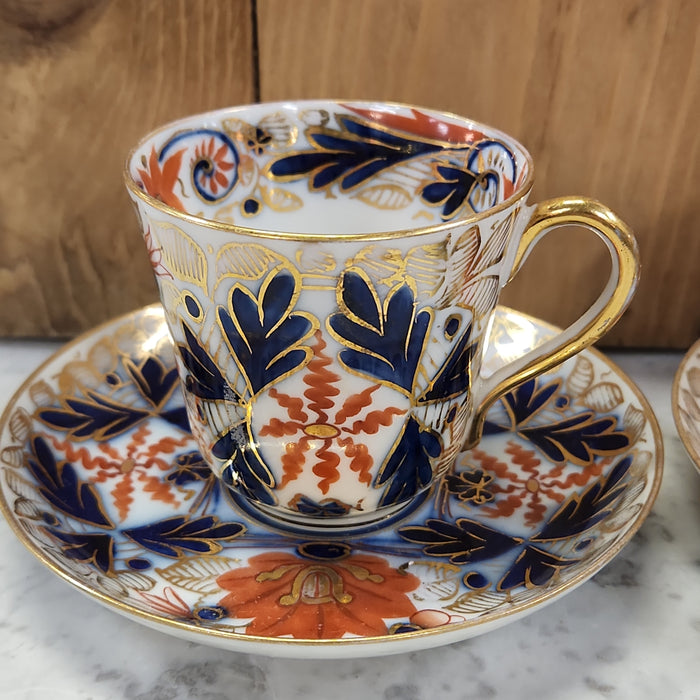 PAIR OF GAUDY WELCH ENGLISH CUPS AND SAUCERS