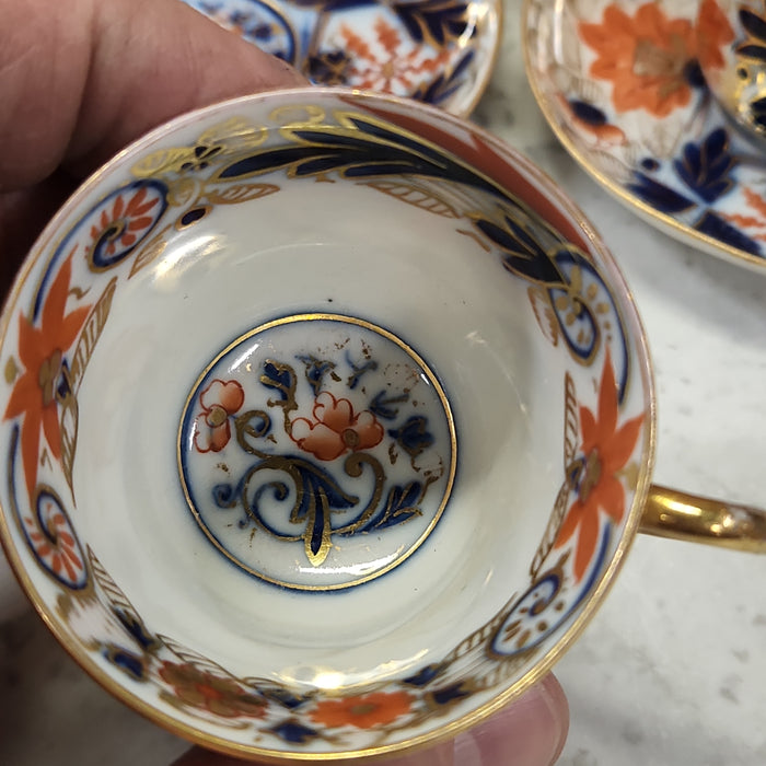 PAIR OF GAUDY WELCH ENGLISH CUPS AND SAUCERS