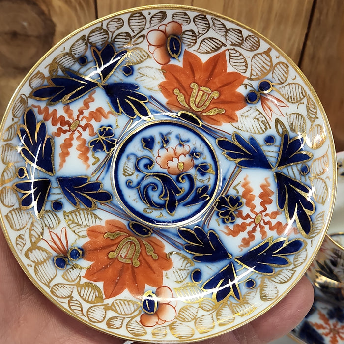 PAIR OF GAUDY WELCH ENGLISH CUPS AND SAUCERS