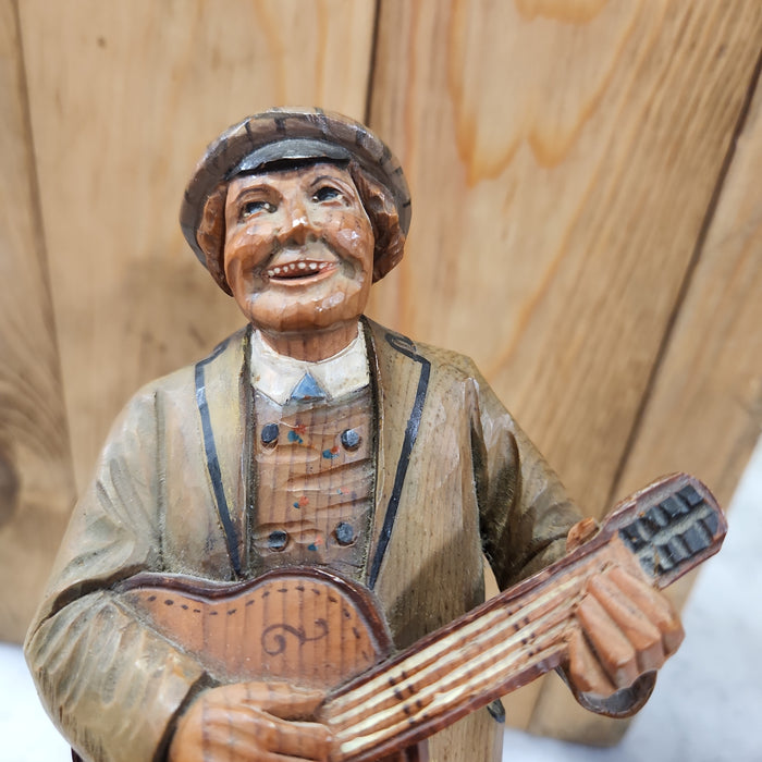 WOOD SWISS CARVING OF GUITARMAN