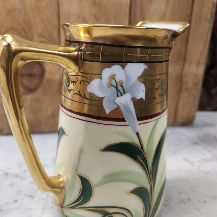 LARGE GREEN AND GOLD PICKARD PITCHER WITH LILIES