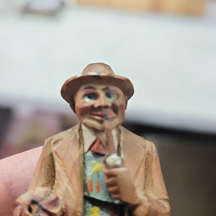 WOOD CARVING OF PIPE SMOKING MAN
