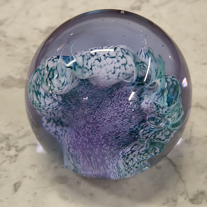 BLUE AND WHITE WAVE FORM PAPERWEIGHT